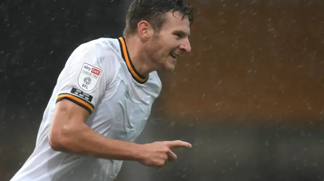 Cambridge United striker Paul Mullin celebrates a goal