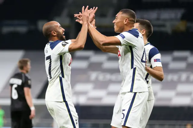 Moura celebrates with Carlos Vinicius for Tottenham