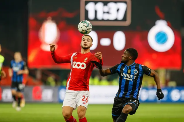 Standard Liege's Nicolas Raskin (left)