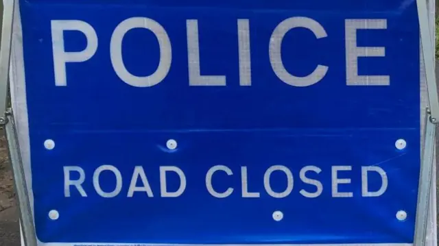 Road closed sign