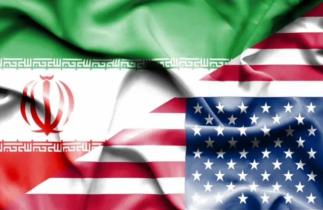 Composite picture of Iran and US flags