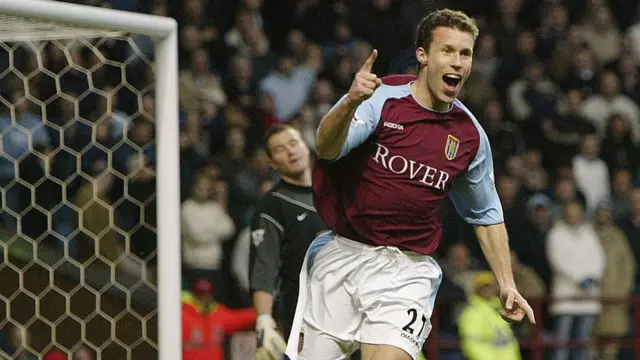 Ronnie Johnsen of Aston Villa celebrates scoring the second goal during the FA Barclaycard Premiership match between Aston Villa and Leeds United at Villa Park on February 7, 2004