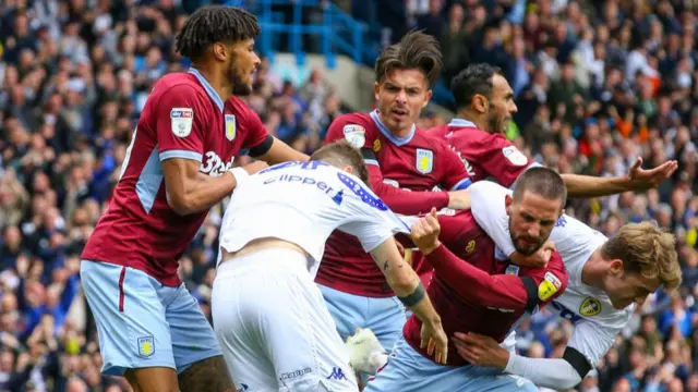 Aston Villa and Leeds United players clash following the hosts' contentious opening goal in the Championship in April 2019