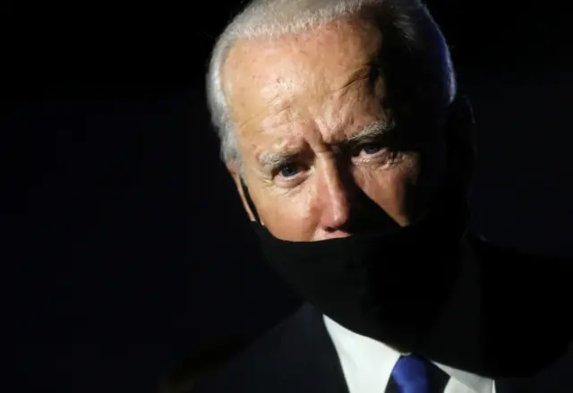 Democratic presidential candidate Joe Biden pictured as he talks to reporters while leaving the debate