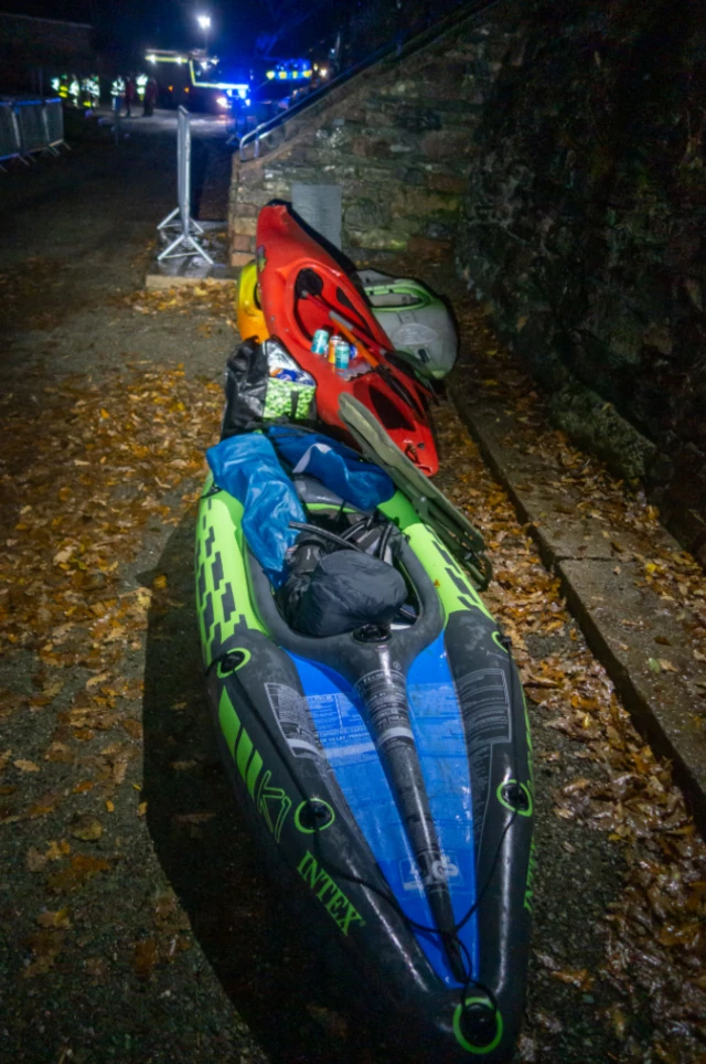 Kayaks with blue lights