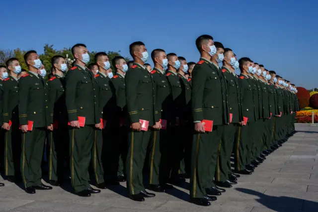 Chinese soldiers mark the 70th anniversary of China’s entry into the Korean War, in Tiananmen Square, Beijing on 23 October 2020