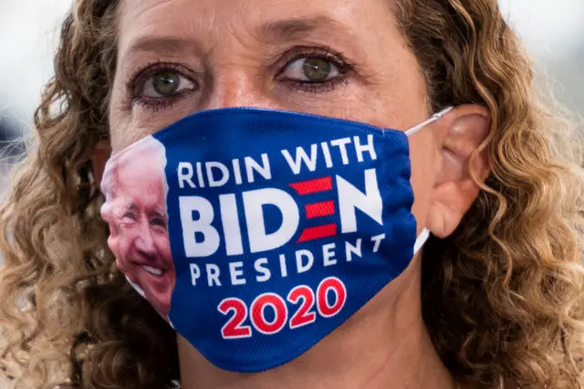 Woman in Biden mask