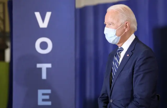 Joe Biden wears a mask