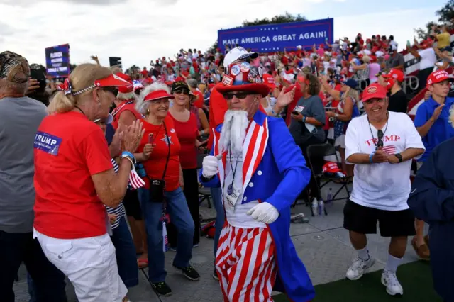 At least one attendee wore a costume for the occasion, but few wore face masks