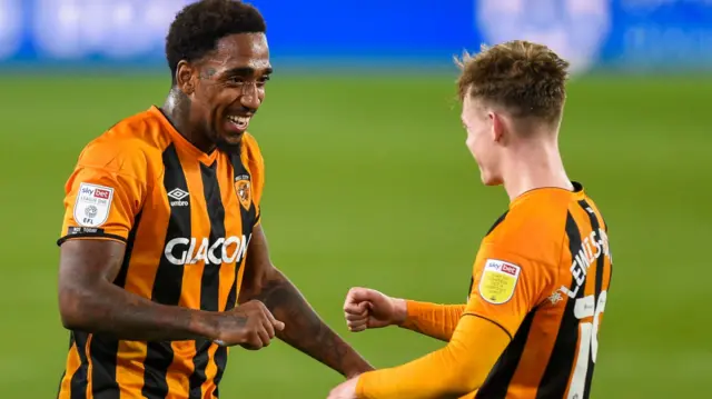 Hull forward Mallik Wilks celebrates a goal with Keane Lewis-Potter