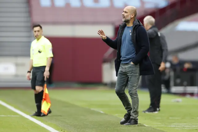 Pep Guardiola on the touchline during Manchester City's game against West Ham.