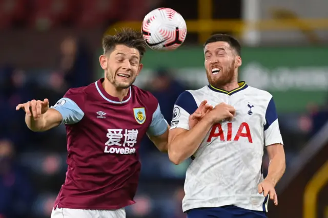 Burnley's James Tarkowski challenges Tottenham's Matt Doherty