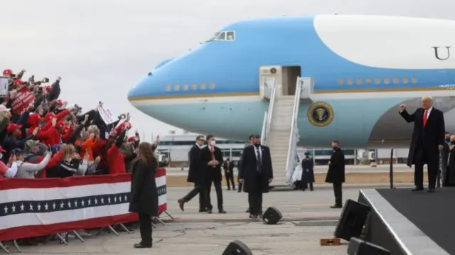 President Donald Trump arrives for a rally in New Hampshire