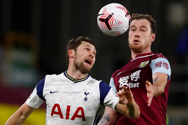 Tottenham's Ben Davies competes with Burnley's Ashley Barnes