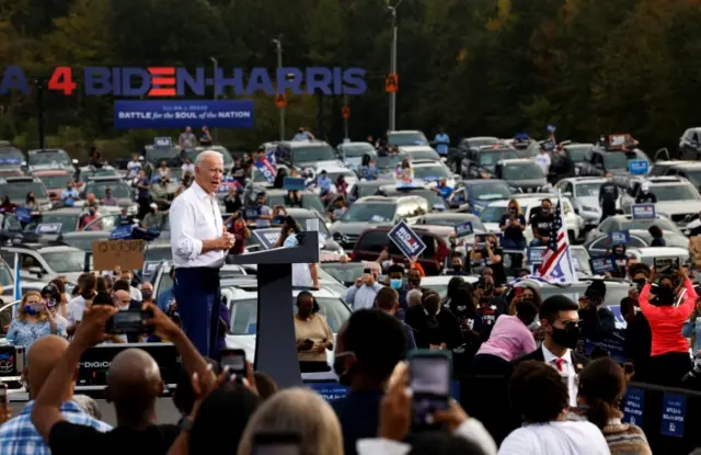 Biden was speaking to a drive-in rally in Atlanta