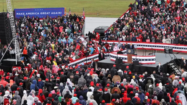 Donald Trump speaks to supporters during a campaign rally at Capital Region International Airport in Lansing, Michigan US, 27 October, 2020. R