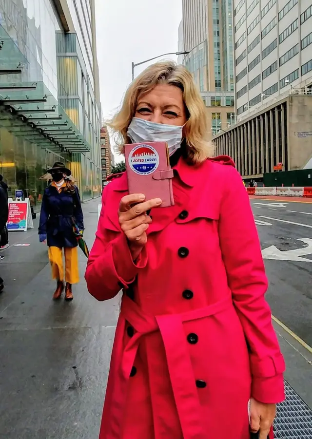 Laura Trevelyan shows off her 'I voted early' sticker