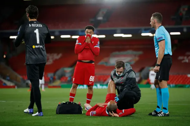 Liverpool's Fabinho receives treatment