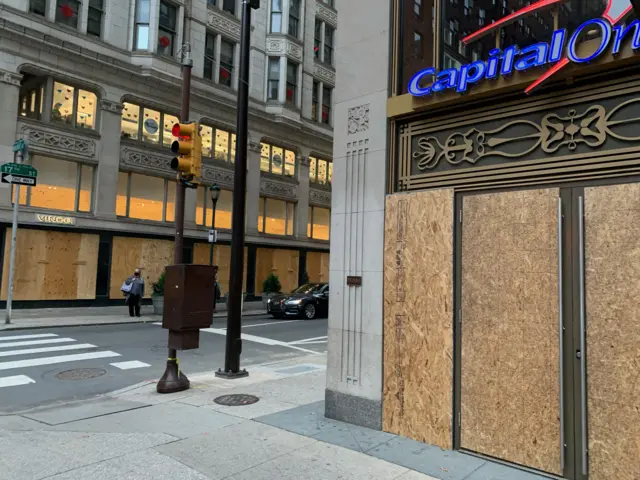 Boarded up shop windows in Philadelphia