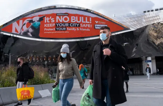 People in masks in Birmingham