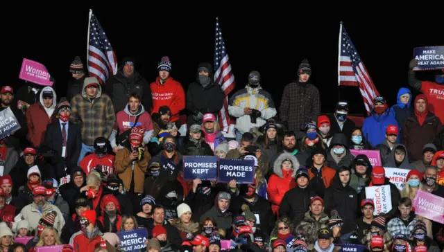 People wrapped up warm to attend the outdoor rally in Omaha but thousands were left stranded in the cold