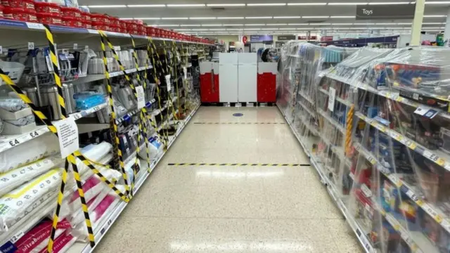 supermarket shelves covered