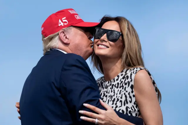 Trump smooched his wife Melania on stage before the rally began