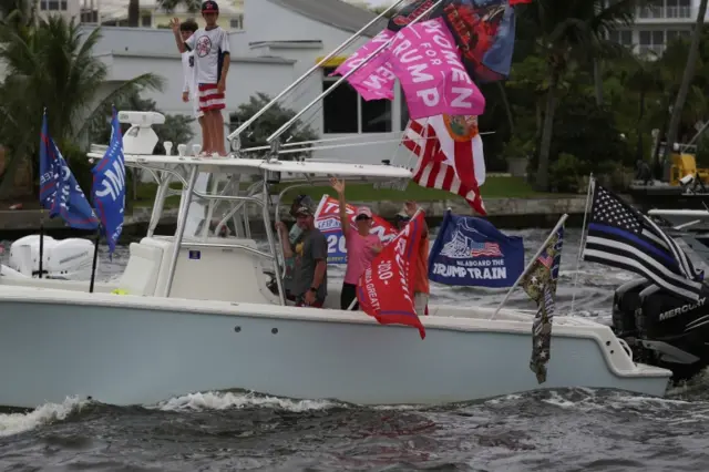 Supporters of US President Donald Trump hold a boat parade in Fort Lauderdale, Florida, on 3 October 2020