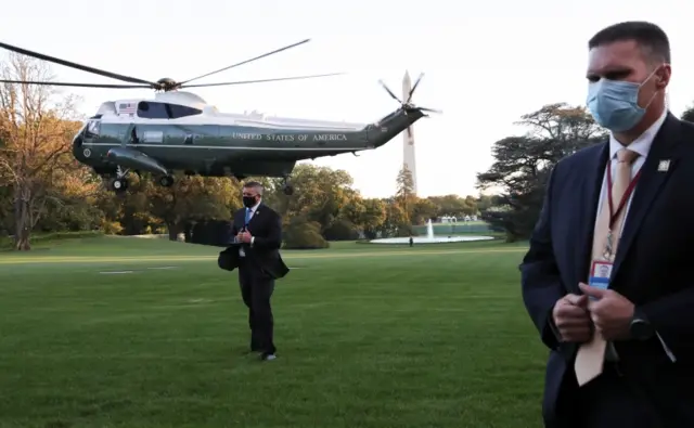 Secret service agents and President Trump's Marine 1 helicopter, 2 October 2020