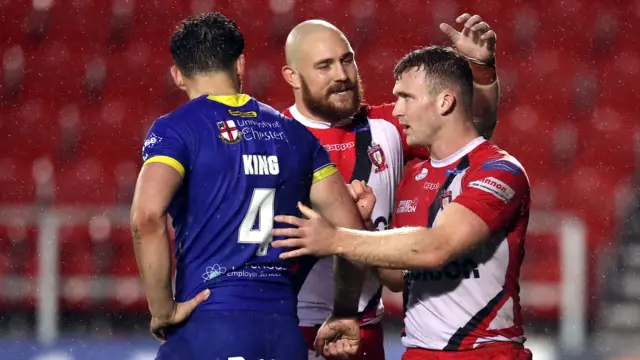 Salford Red Devils' Joey Lussick (right) celebrates scoring the winning try with team-mate Gil Dudson