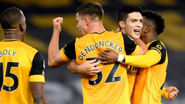 Wolves celebrating scoring in their last match