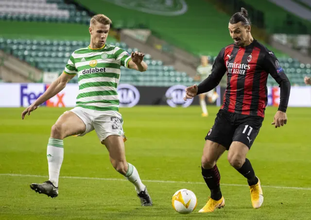 Kristoffer Ajer takes on AC Milan's Zlatan Ibrahimovic