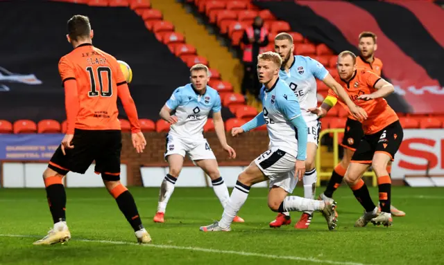 Nicky Clark scores for Dundee United against Ross County