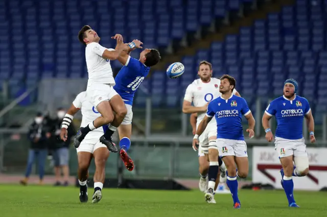 George Furbank of England battles with Paolo Garbisi of Italy in the air during the 2020 Guinness Six Nations match between Italy and England at Olimpico Stadium