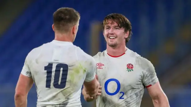 Owen Farrell and Tom Curry celebrate England's win over Italy