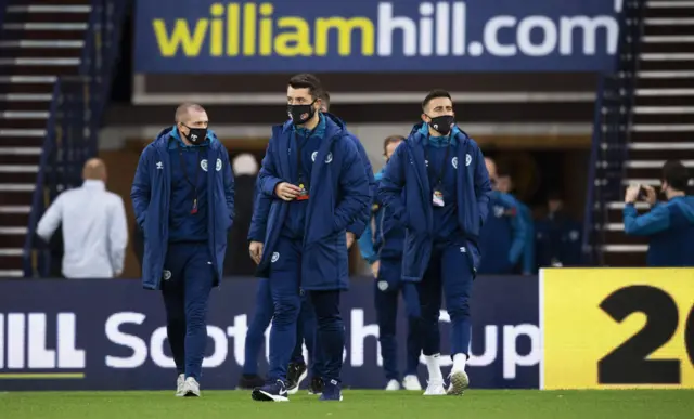 Hearts' Craig Halkett leads the Hearts players out to inspect the pitch before the clash with Hibernian