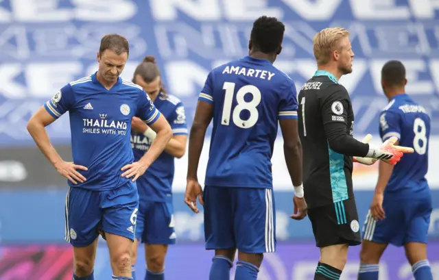 Jonny Evans looks on as Leicester concede