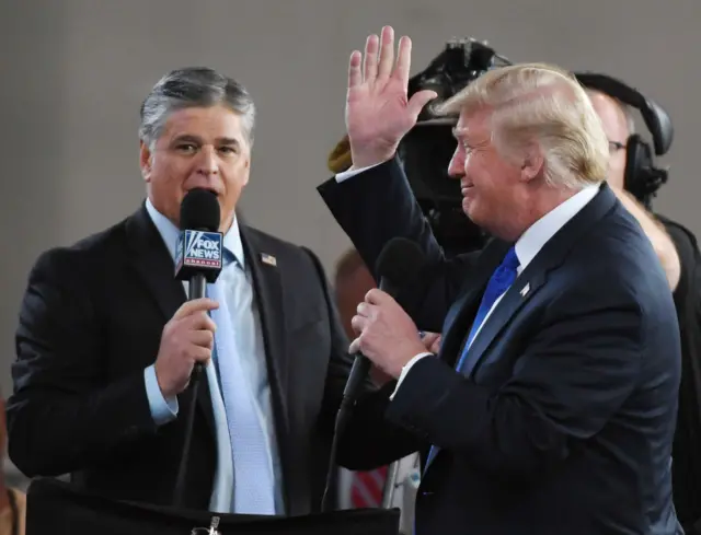 Donald Trump appeared on Sean Hannity's (pictured here in 2018) Fox News show on Thursday without saying he tested positive for Covid-19