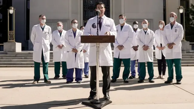 US Navy Commander Dr. Sean Conley, the White House physician, flanked by other doctors