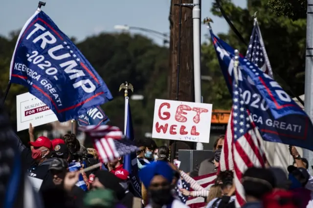 Supporters of US President DonaldTrump gather outside of Walter Reed National Military Hospital