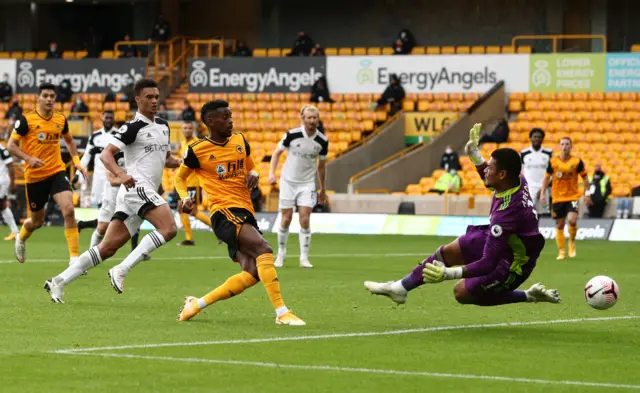 Wolves' Nelson Semedo has a shot saved against Fulham