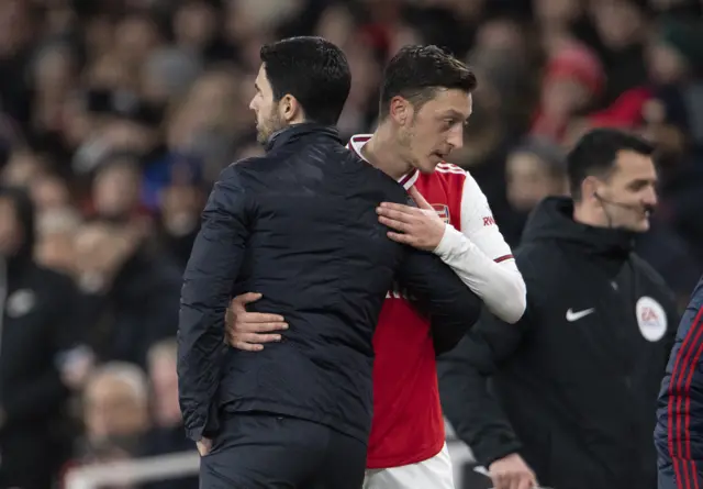 Mikel Arteta and Mesut Ozil