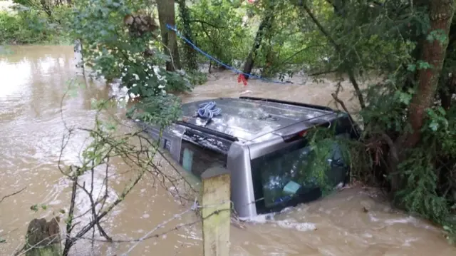 The vehicle in flood water