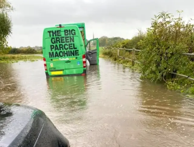 Van stuck in floodwater on Mythe Lane, in Witherley, Leicestershire