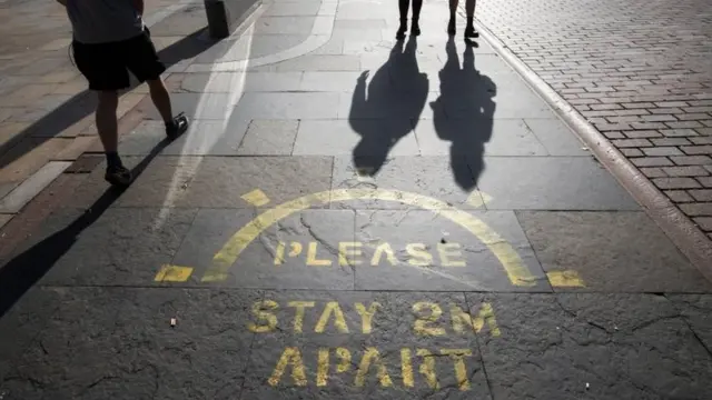 A sign warning of the two-metre rule in Dundee