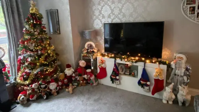 Front room with tree and decorations