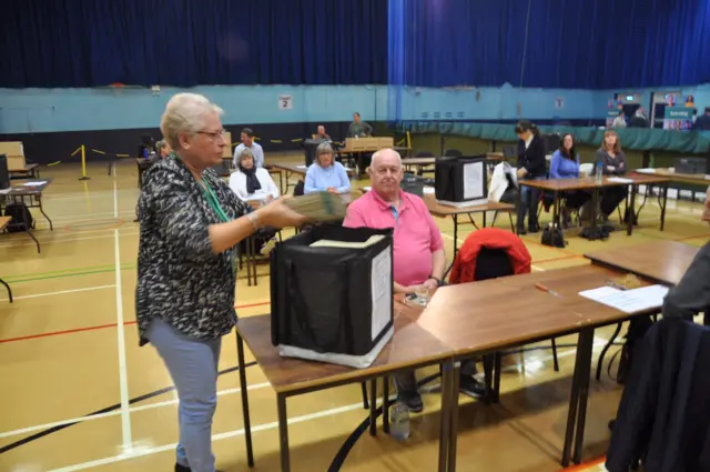 Ballot box being opened