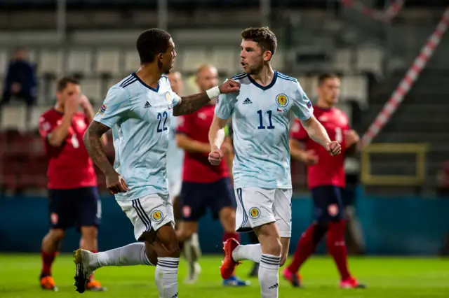 Scotland's Liam Palmer and Ryan Christie celebrate