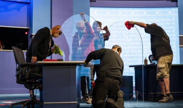 Plexiglass screens were erected around the candidates' desks as a precaution against the spread of coronavirus