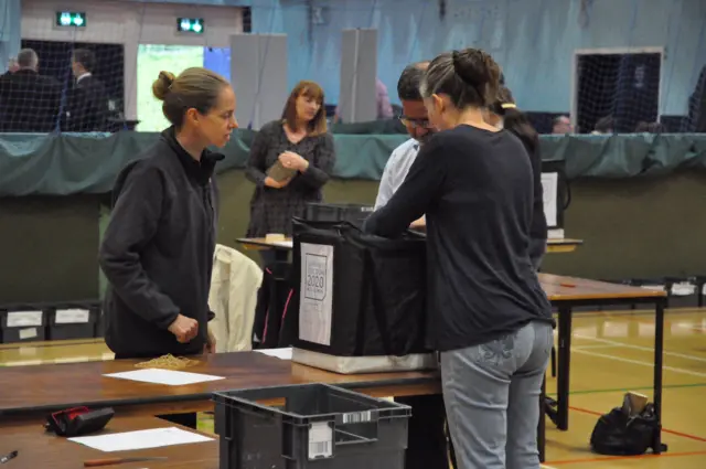 Ballot box being opened